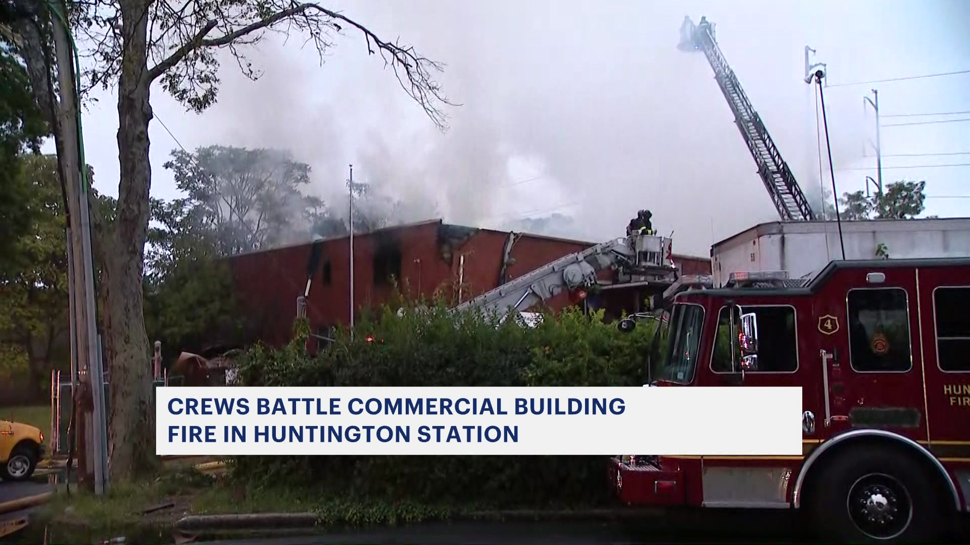 Fire rips through commercial building in Huntington Station