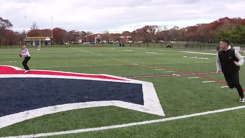 Story image: Smithtown football player gives thanks for new field 