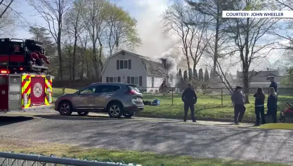 Officials: Fire dispatcher's wife alerts him about blaze at their Centereach home 