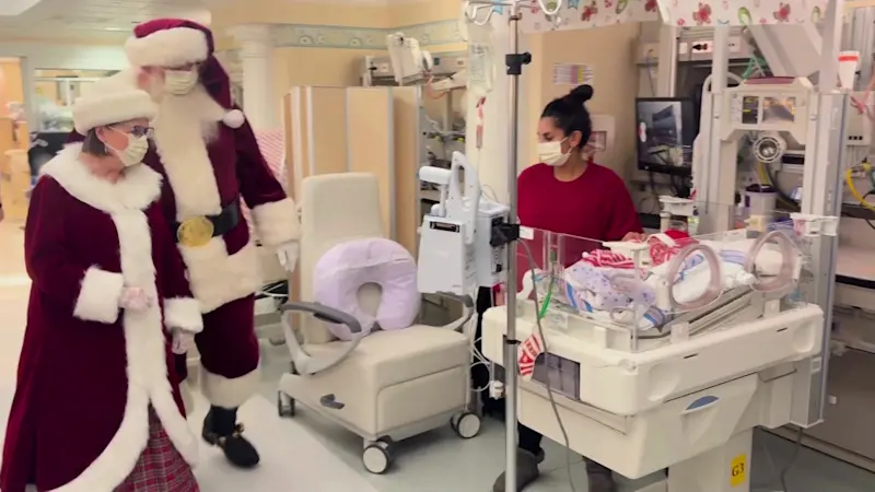 Story image: Santa and Mrs. Claus visit kids at White Plains Hospital