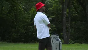 Former NY Giants player swings the golf clubs to raise money for foundation