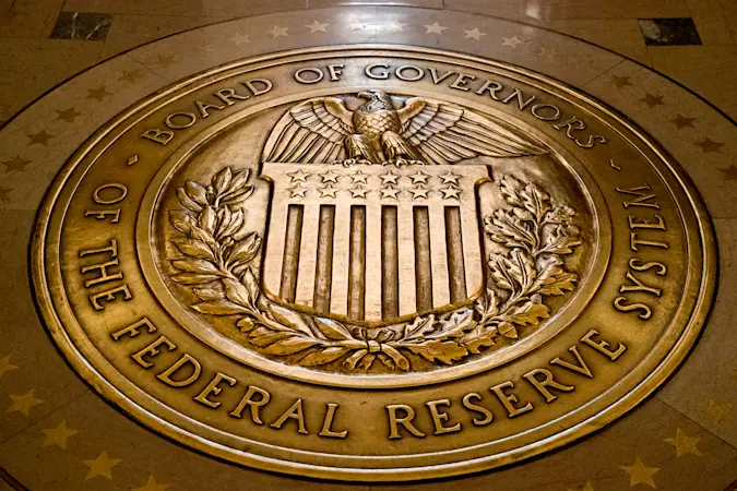 Story image: Federal Reserve cuts key rate by quarter-point and signals two more cuts this year