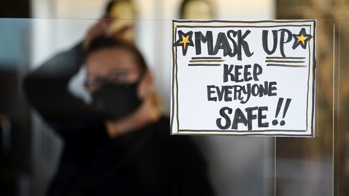 Keep the Mask: Vaccine Won't End Coronavirus Crisis Right Away