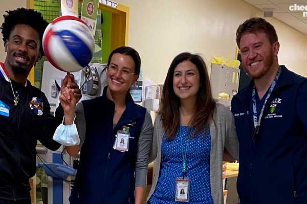 On a Positive Note: Children's Hospital Scores Fun Day With Famed Harlem Globetrotter